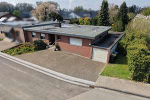 Grosszügiger Bungalow mit Wintergarten, grossem Keller und 3er - Garage in Fliesteden