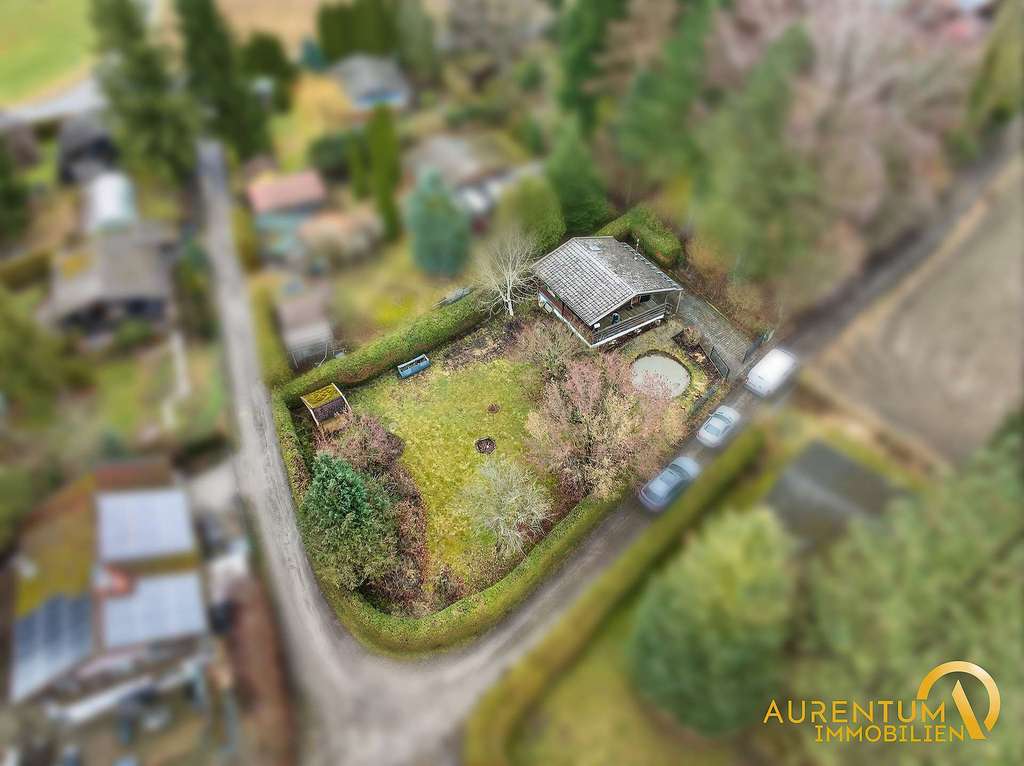 Immobilie in Wurmsham - Charmantes Ferienhaus auf großem Grundstück – inklusive genehmigter Neubauplanung - Bild 1