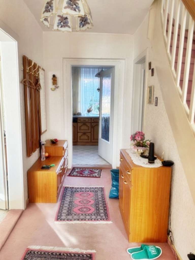 Immobilie in Braunsbedra - Charmantes Reihenmittelhaus mit Garten, 2 Garagen und Wintergarten in ruhiger Lage von Braunsbedra - Bild 4