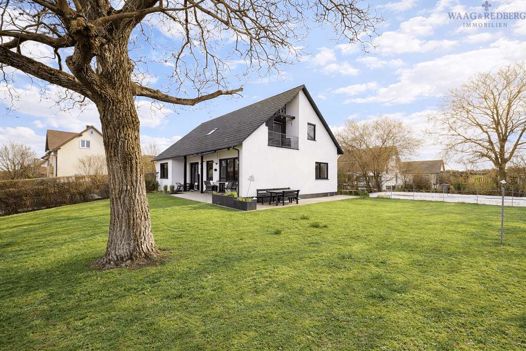 Immobilie in Hilpoltstein - Großzügiges Wohnen auf drei Ebenen mit großem Grundstück - Bild 0