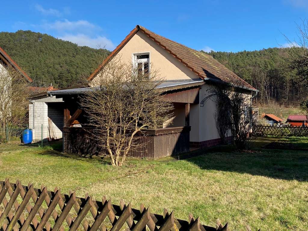 Immobilie in Schindhard - Solides Einfamilienhaus mit Potential und Nebengebäuden in ruhiger, sonniger Lage von Schindhard - Bild 3