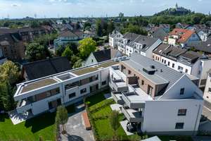 Großzügige 4-5 Zimmer Eigentumswohnung mit großer Terrasse und Garten