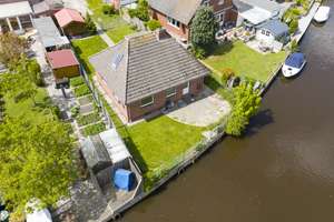Ruhig und direkt am Wasser: renovierter 4-Zimmer-Bungalow in Loppersum, Hinte. Provisionsfrei! – Loppersumerstraße 24, 26759 Hinte – Vorschaubild 4