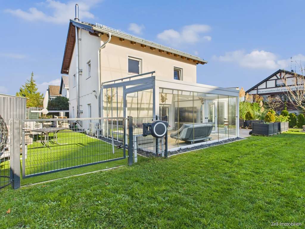 Immobilie in Geisenheim - Neuwertiges, energieeffizientes Einfamilienhaus mit Wintergarten und 801 qm großem Grundstück - Bild 2