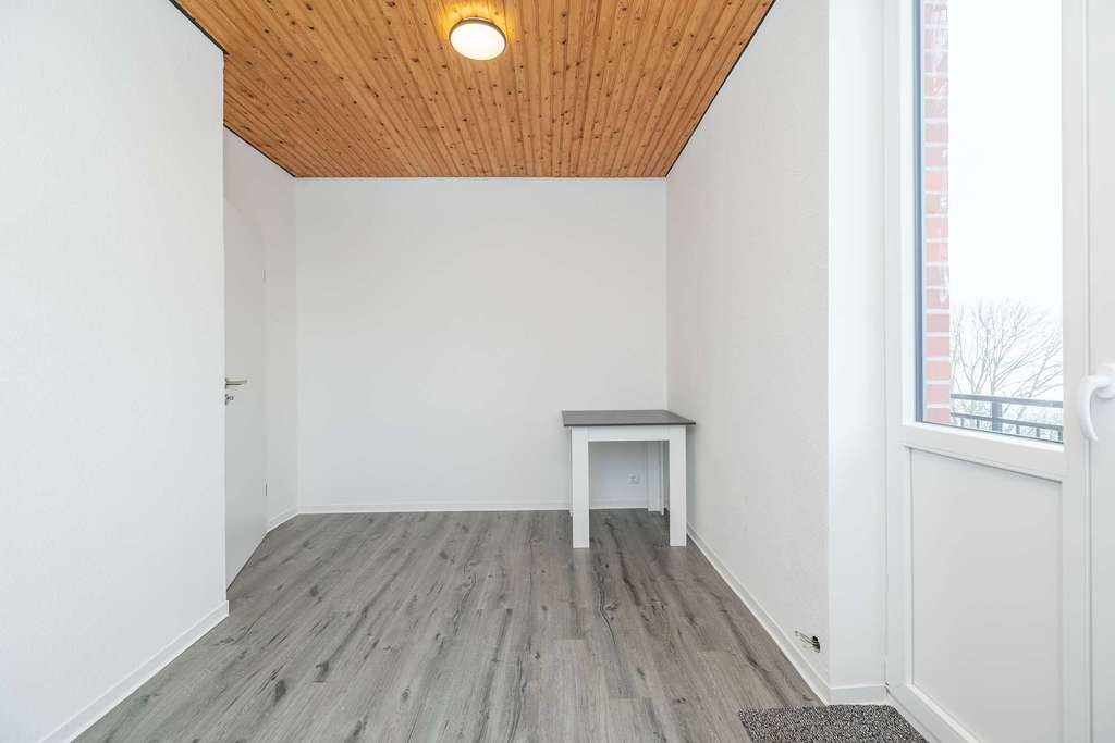 Immobilie in Meldorf - Stil trifft Geschichte | Renovierte 2-Zimmer-Wohnung im alten Schlosshotel - Bild 4