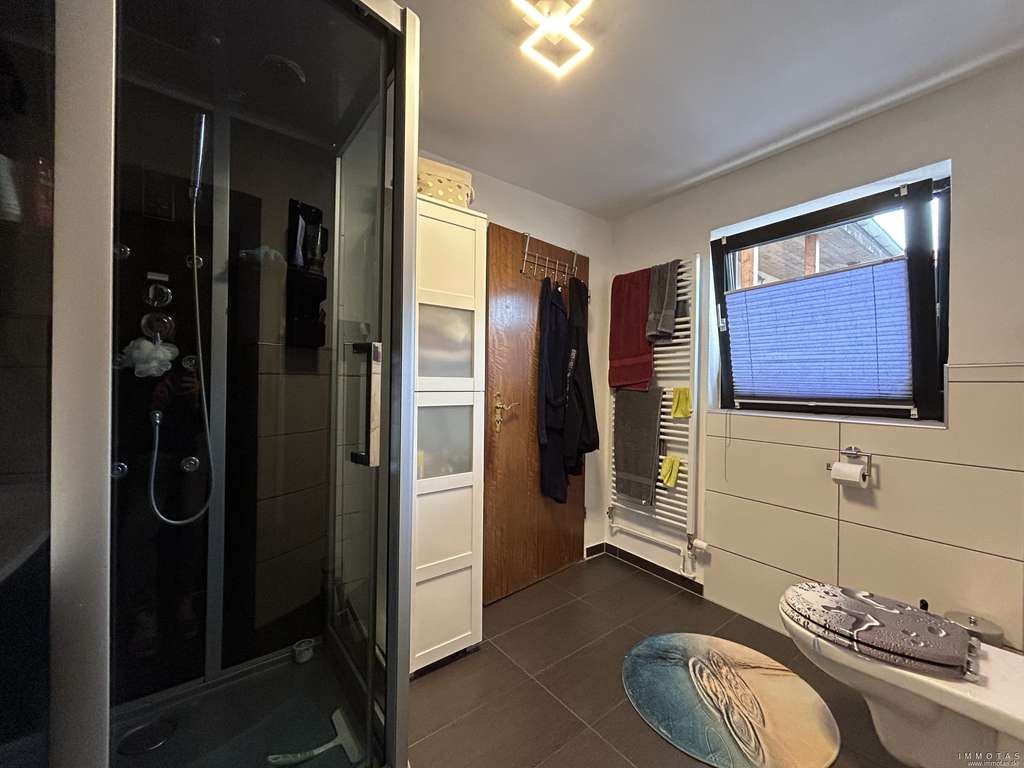 Immobilie in Gau-Bickelheim - Modernisiertes Raumwunder: Ihr neues Zuhause als Ein- oder Zweifamilienhaus – Einziehen & Wohlfühlen - Bild 4