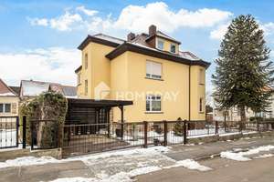 Stilvolles Zweifamilienhaus mit Vollkeller, Gartenidylle und vielseitigen Nutzungsmöglichkeiten