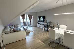 3-Zimmer DG- Wohnung mit Garten und Stellplatz