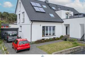 Familienfreundliche Erdgeschosswohnung mit Hauscharakter, Garten & Terrasse in ruhiger Sackgasse
