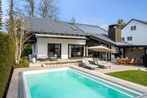 AIGNER - Exklusives Einfamilienhaus mit traumhaftem Südgarten und Pool – Die vollständige Adresse der Immobilie erhältst du vom Anbieter., 82194 Gröbenzell – Vorschaubild 1