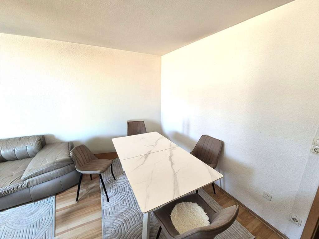 Immobilie in Uhingen - Familienfreundliche 4-Zimmer-Wohnung mit Balkon und Tiefgaragenstellplatz - Bild 2