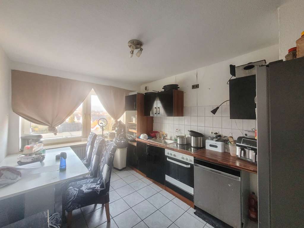 Immobilie in Springe - Vermietete 4-Zimmer-Wohnung mit Potenzial in gepflegten Mehrfamilienhaus - Bild 2