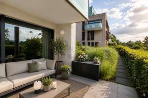 Riedberg: Hochwertige 3-Zimmer-Gartenwohnung mit 2 TG-Stellplätzen
