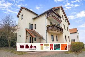 Großzügige EG-Wohnung mit Kamin, Gartenanteil & Garage – komfortables Wohnen mit Hauscharakter