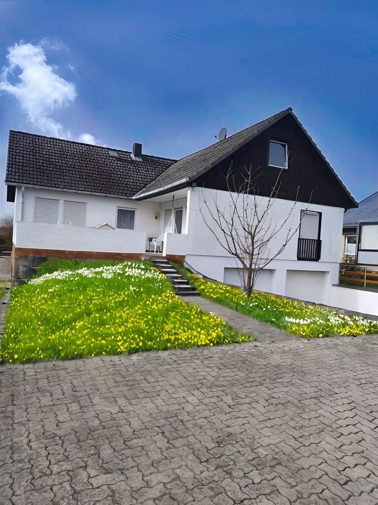 Immobilie in Ehra-Lessien - Familienfreundliches Haus in ruhiger Wohnlage.
Knisternder Kamin im Winter und sonnenverwöhnte Terr - Bild 0