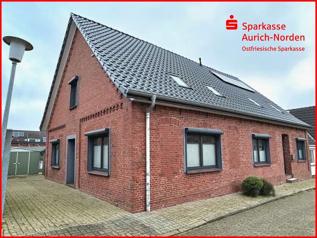 Immobilie in Hinte - Einfamilienhaus mit Einliegerwohnung in zentraler Wohnlage von Hinte - Bild 0