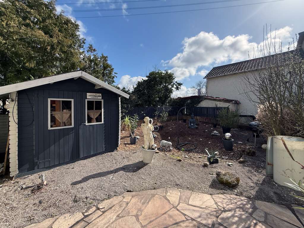 Immobilie in Zeiskam - Gepflegtes Einfamilienhaus mit separater Einliegerwohnung, Garten und Garage - Bild 2