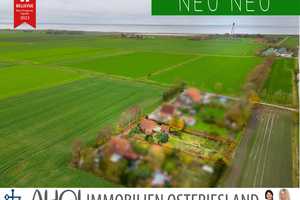 Einen Steinwurf vom Deich:
Teilmodernisiertes Einfamilienhaus mit Nebengebäude        auf 
weitläu – Aurich (Kreis) – Vorschaubild 1