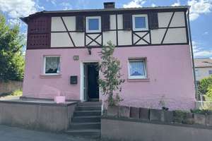 Verkauf: Schnuckeliges Einfamilienhaus mit Weitblick und Sanierungsbedarf in Höhenlage von Höchberg – Die vollständige Adresse der Immobilie erhältst du vom Anbieter., 97204 Höchberg – Vorschaubild 2