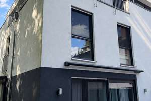 Exklusive Einfamiliendoppelhaushälfte mit Carport und Terrasse in Köln-Merheim Modernes Wohnen mit d