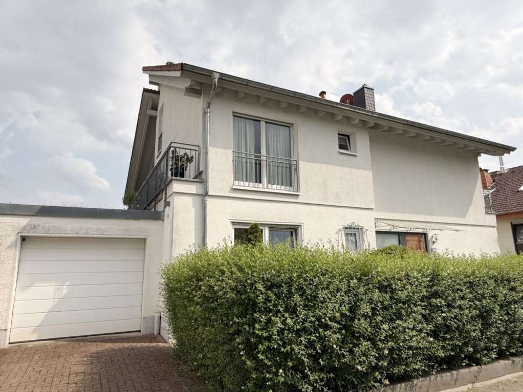 Ein "Haus im Haus" mit zusätzlicher Einliegerwohnung in Bestlage am Hofheimer Steinberg