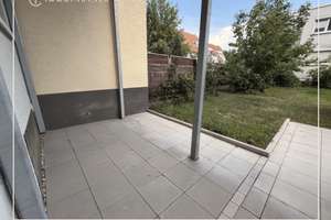 Stilvolle 1,5-Zimmer-Wohnung mit Terrasse und Garten in Top-Lage