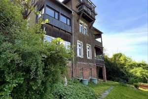 Charmantes Mehrfamilienhaus mit großem Gartengrundstück, herrlichem Blick und Entwicklungspotenzial