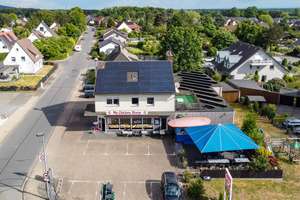 Solides Renditeobjekt – Wohn- und Geschäftshaus mit Anbaupotenzial und Photovoltaik – Die vollständige Adresse der Immobilie erhältst du vom Anbieter., 33803 Steinhagen – Vorschaubild 1