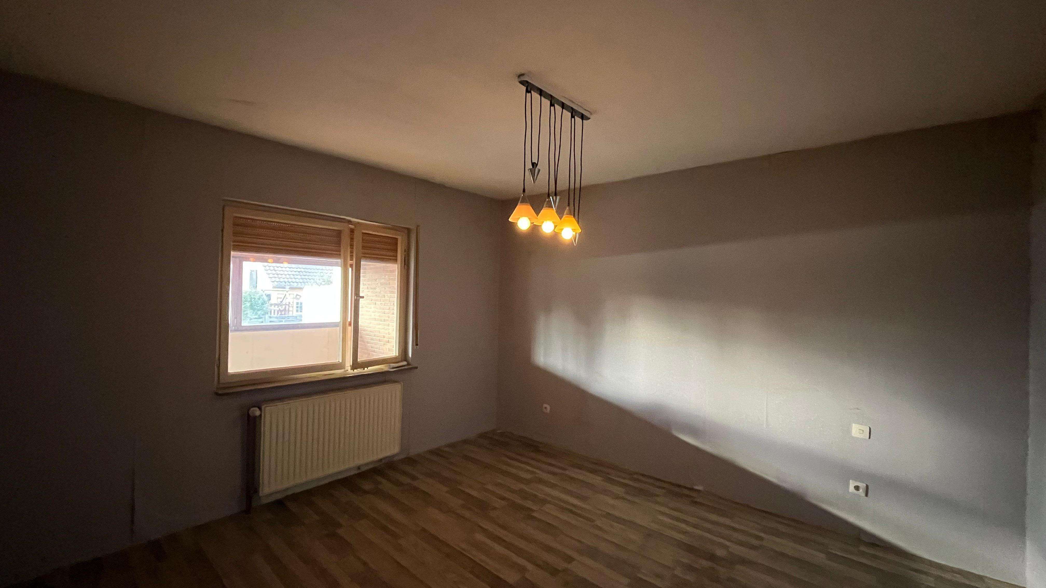 Immobilie in Hamm am Rhein - Charmantes Einfamilienhaus mit Potenzial - Bild 1