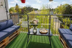 Renovierte Dachgeschosswohnung mit Tiefgarage, Balkon und Wassernähe