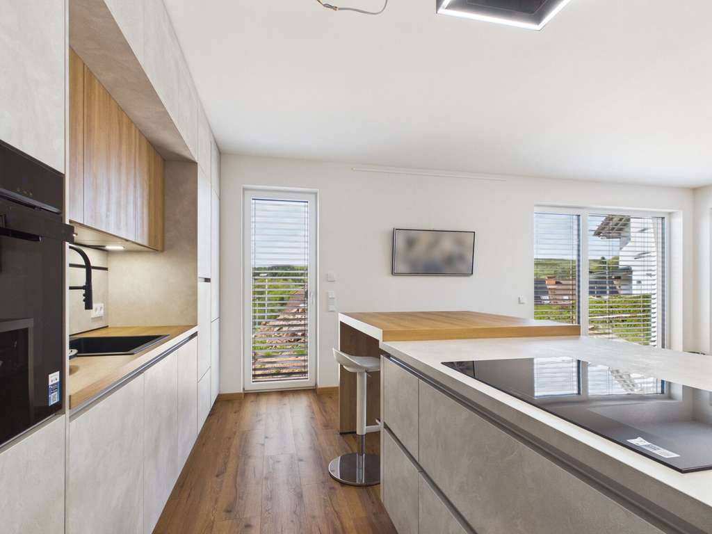 Immobilie in Oberthulba - A+ Einfamilienhaus mit großzügigem Platzangebot und Studio mit separatem Eingang - BJ 2025 - Bild 1