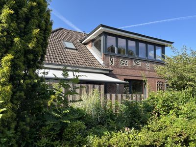 Arbeiten und Wohnen unter einem Dach! Vielseitig nutzbares Zweifamilienhaus.