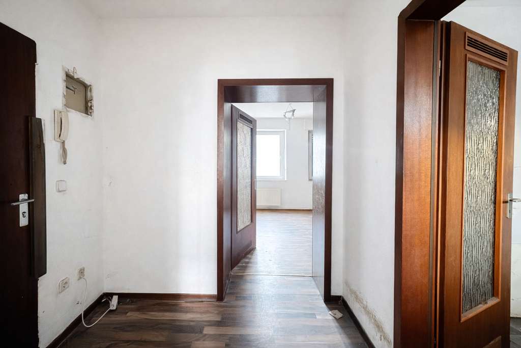 Immobilie in Herne - Sanierungsbedürftige Eigentumswohnung mit Terrasse - Innenstadtlage - Bild 2