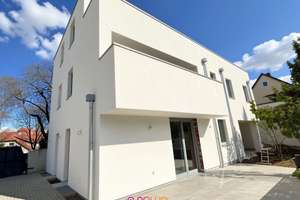 Neubau-Erstbezug: barrierefreie Wohnung mit Terrasse, Garten und Carport!