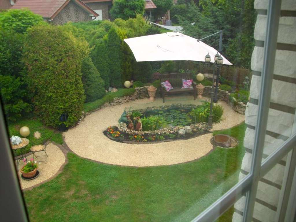 Immobilie in Delbrück - Dellbrück – Einfamilienhaus mit ca 200qm Wfl. auf zwei Etagen mit Garten, Teich & Doppelgarage - Bild 0