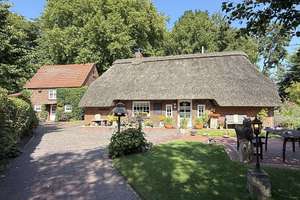 Historisches Reetdachhaus mit Charme in Küstennähe – Blumenstr. 1, 26969 Butjadingen – Vorschaubild 1