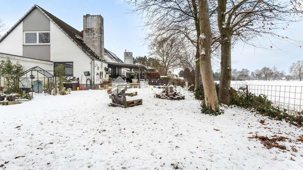 Immobilie in Worpswede - Großzügige Doppelhaushälfte mit Einliegerwohnung, Vollkeller und schönem Garten in ruhiger Feldlage - Bild 1