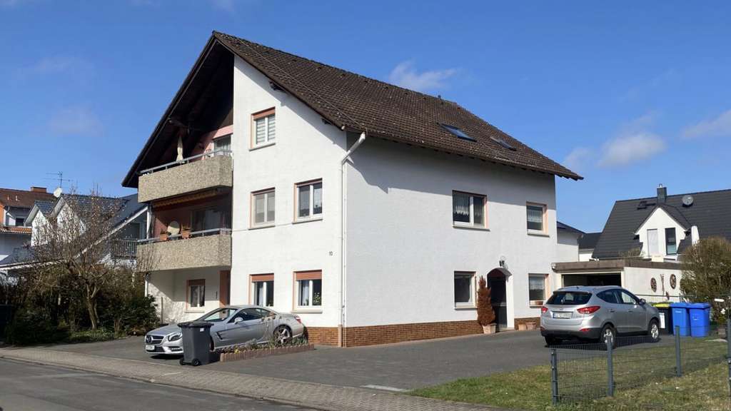 Immobilie in Buseck - Schönes, gepflegtes 3-Familienhaus in Buseck-Trohe - Bild 1