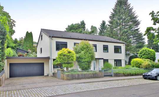 Familienfreundliches Einfamilienhaus mit Einliegerwohnung, großzügigem Garten und Ausbaupotenzial