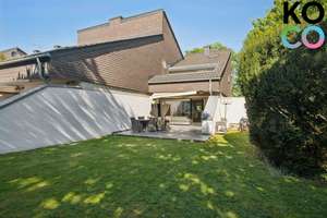 Perfektes Wohnen am Bunten Garten! Luxuriöses Reihenendhaus - mit Privatgarten, Terrassen & Garage