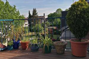 Charmante lichtdurchflutete  Eigentumswohnung mit Dachterrasse in Südlage
