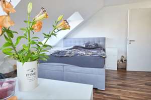 Exklusive 4-Zi.-Maisonette mit Loggia, 2 Bädern, Aufzug & Tiefgarage