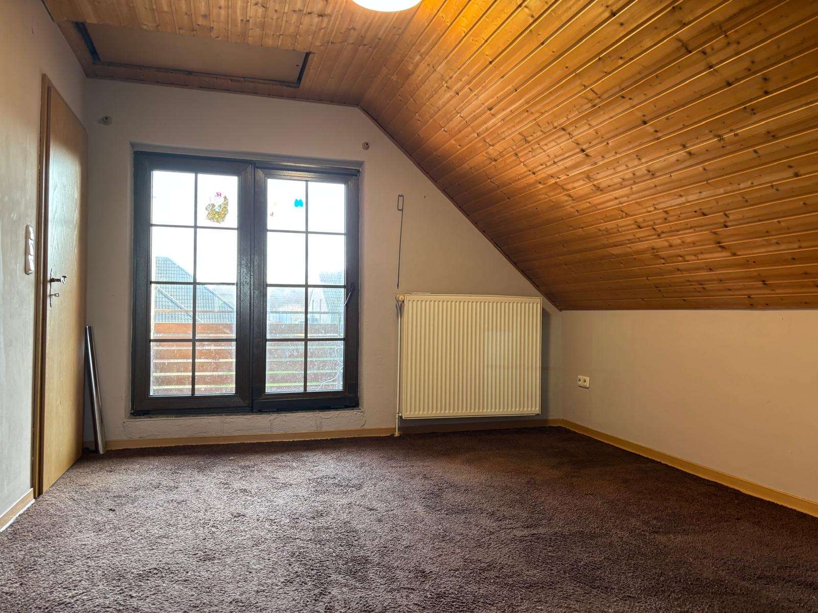 Immobilie in Großheide - Einfamilienhaus mit Einliegerwohnung in Sackgassenlage - Bild 3