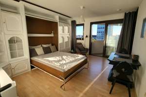 1 Zimmer Apartment mit Traumblick über München + Pool / Sauna und Tiefgaragenstellplatz