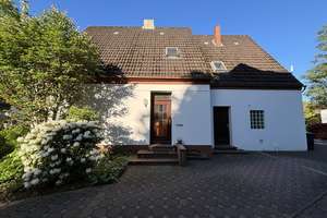 Charmantes Ein-/Zweifamilienhaus mit großem Garten in Bremen-Schönebeck – viel Potenzial!