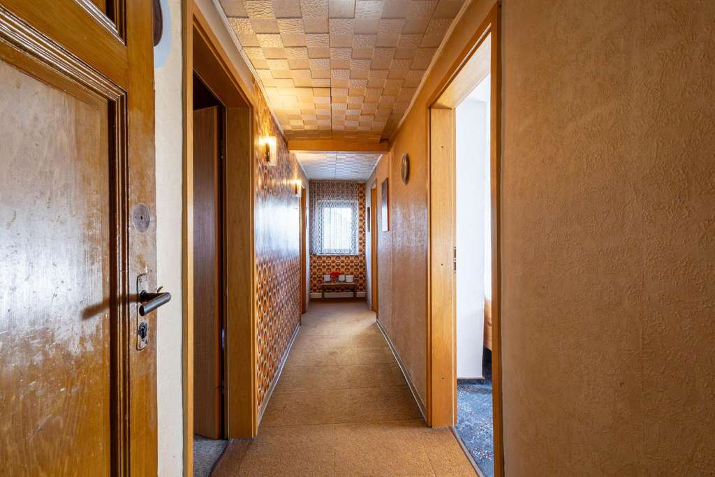 Immobilie in Waldmohr - Wohn- und Geschäftshaus mit vermieteter Gewerbeeinheit - Bild 1