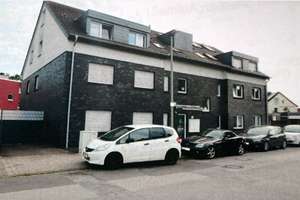Moderne 2-Zimmer Erdgeschosswohnung mit eigenem Garten, Terrasse und Garage in Duisburg-Rumeln