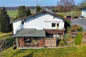 Vielseitiges Ein-/Zweifamilienhaus mit wundervollen Grundstück zwei Garagen und viel Potential! – Die vollständige Adresse der Immobilie erhältst du vom Anbieter., 56244 Wölferlingen – Vorschaubild 5