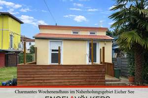 Wohnen, wo andere Urlaub machen - Charmantes Wochenendhaus im Naherholungsgebiet Eicher See – Die vollständige Adresse der Immobilie erhältst du vom Anbieter., 67575 Eich – Vorschaubild 1