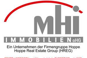 MHI - Exklusive Eigentumswohnung mit Garten und zwei Tiefgaragen-Stellplätzen in Spitzenlage